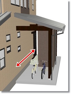 玄関横に自転車置き場と物置